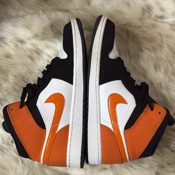 Air Jordan Black and Orange Sneakers
